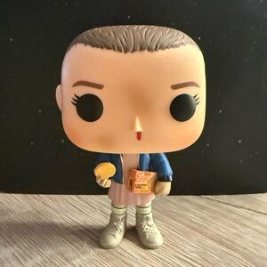 Funko Blue Jacket Eleven Pop! Figure with Pink Dress and Tan Shoes